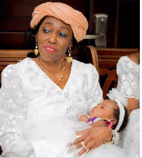 Former First Lady Nana Konadu Agyemang Rawlings carrying the 'Royal baby'