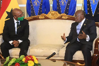 President Akufo-Addo speaks with one of the new envoys