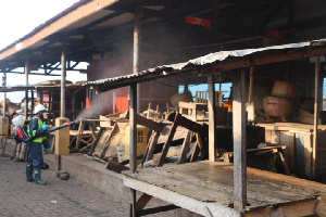 Disinfection exercise being carried out in a market