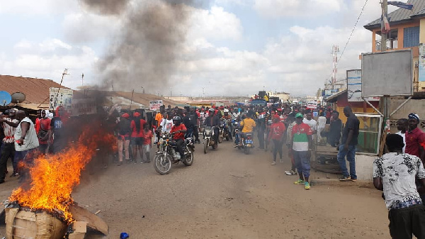 The protestors blocked major roads in Ashaiman