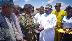 Vice President, Dr Mahamudu Bawumia presenting an item to Akwa