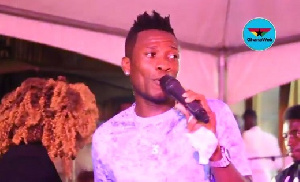 Asamoah Gyan performing to celebrate his 50th goal for Ghana