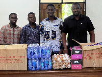 John Dumelo and some of the students