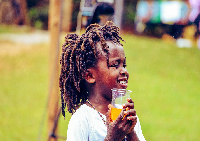 A child in locs. Image via Wikimedia Commons/ Isiyekala