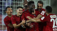 Asamoah Gyan jubilating with his NorthEast United teammates