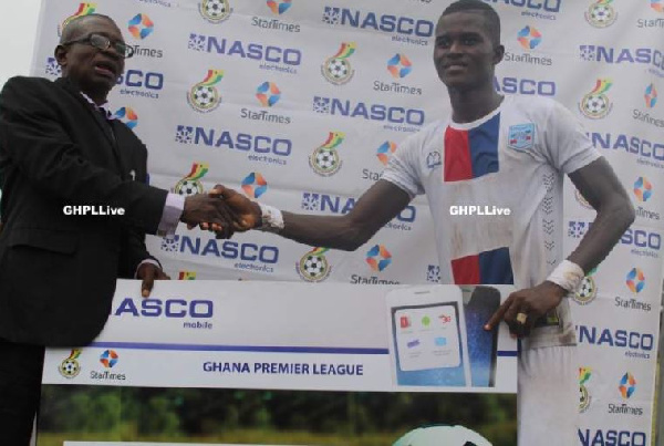 Samuel Sarfo of Liberty Professionals recieves his award as Man of the Match