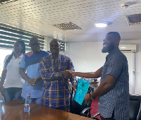 Alfred Asiedu Adjei receiving his nomination forms for NALAG Presidency