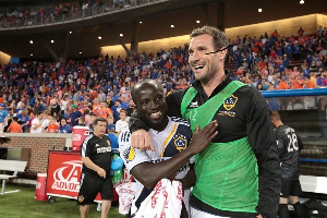 Emmanuel Boateng hugging a teammate