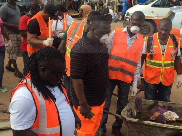 Some personnel cleaning the city