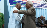 President  Akufo-Addo and the Prof Emmanuel Martey in hand shake