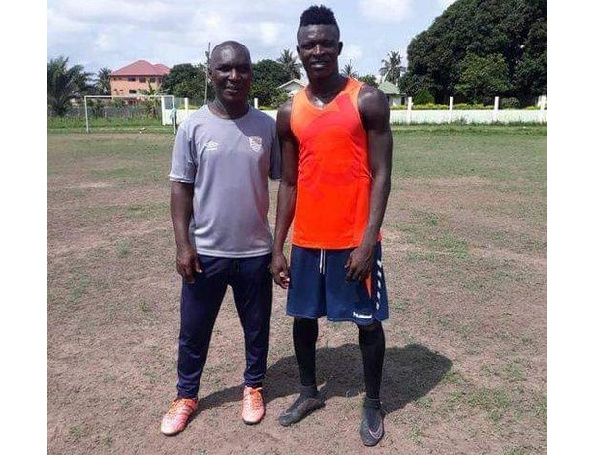 Hearts of Oak coach with Victor Aidoo