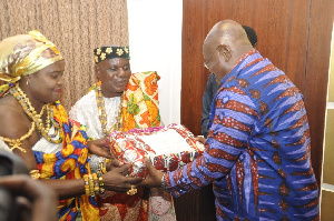 Torgbui Dey III Presenting A Wrapped Gift To President Akufo Addo With The Help Of A Queen Mother 10