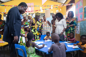 Rev Ntim Fordjour interacting with some children