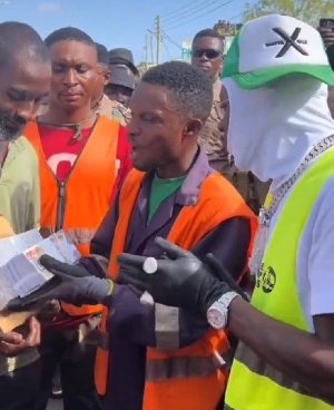 Shatta Wale with the team during the donation