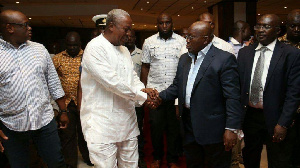 John Mahama (L) shakes Nana Akufo-Addo