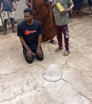 The suspected gay, Yaw Barima Razak going through purification by the Traditional Council