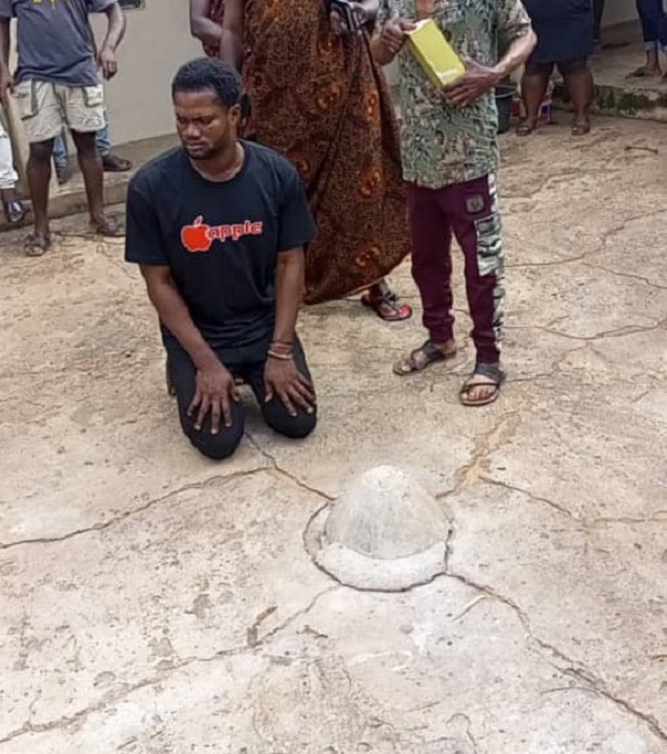 The suspected gay, Yaw Barima Razak going through purification by the Traditional Council