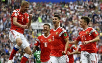 Players of Russia celebrate  their first goal