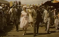 Queen Elizabeth is seen here talking a walk with Kwame Nkrumah at the Makola Market