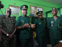 The Comptroller-General of Immigration (CGI), Lawyer Kwame Asuah-Takyi interacting with his men