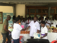 Founder of the Jay Foundation Naa Kuorkor Mayne-Eghan presenting the items to the hospital