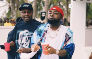 Davido and his aide, Isreal Afeara