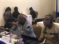 Mr. Douka (middle) addressing the meeting