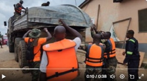 Personnel of the Ghana Armed Forces loading one of thier boats onto a truck