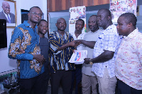 The aspirant (second right) files his nomination forms