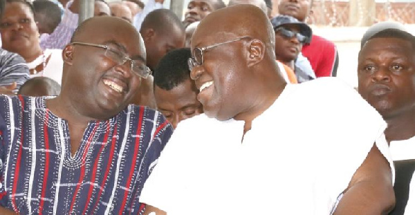 Vice President Dr Mahamudu Bawumia (l) interacting with President Akufo-Addo (r)