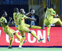 Mali teammates celebrating a goal