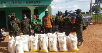 GIS officers with the Togolese and PFJ fertilizers at Bunkpurugu