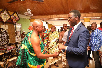 Nana Keasi Bosomprah and Dr Yaw Adutwum in a handshake