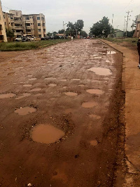 The holes in the road make it unmotorable and yet residents are 'forced' to use it