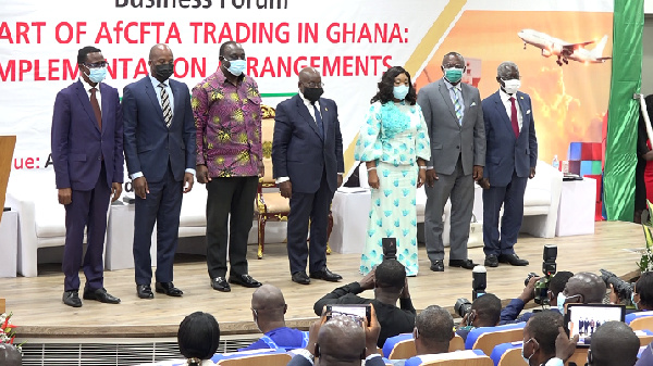 The President of Ghana, Nana Akufo-Addo flanked by others