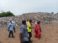 The MP with the officials at the Dekeme rubbish site