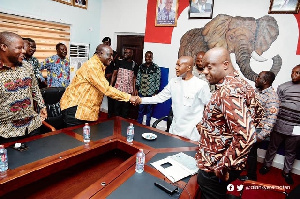 Alan Kyerematen (second left) greets party chair Stephen Ntim