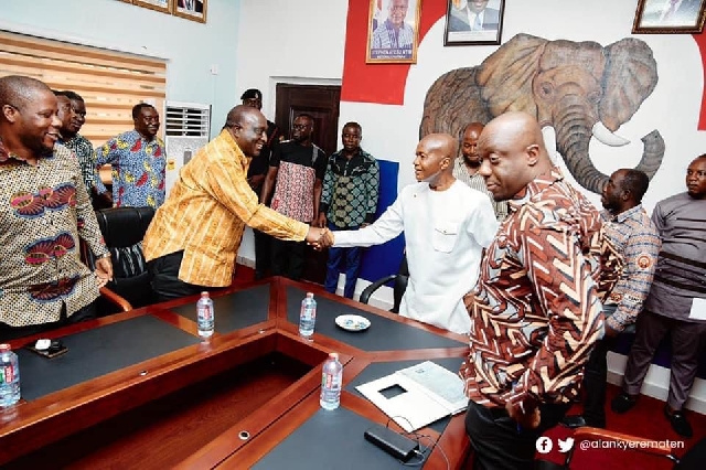 Alan Kyerematen (second left) greets party chair Stephen Ntim