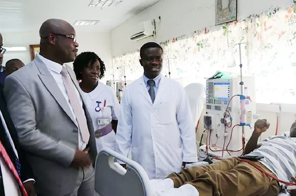 First Sky Group CEO Mr. Eric Seddy Kutortse, meeting with some patients receiving treatment