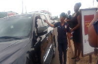 Some of the police personnel sharing flyers to motorists in traffic