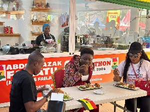 Afua Asantewa and husband enjoy a meal prepared by Chef Faila