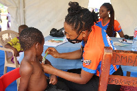 A member of the Medical team checking the Mid Arm Circumference