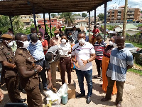 Mr Mireku-Duker to some constituents after the donation exercise