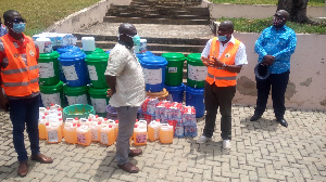 Joe Ghartey, others during the presentation of the items