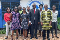 Kofi Akpaloo with some of the staff