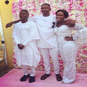 Stonebwoy with his wife and a friend at the naming ceremony