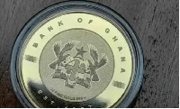 The gold coin aims to reduce dollar hoarding