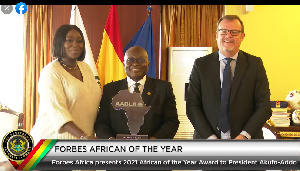 Akufo-Addo receives the Forbes African of the Year award at the Jubilee House