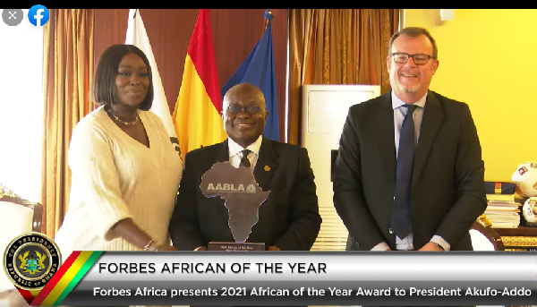 Akufo-Addo receives the Forbes African of the Year award at the Jubilee House