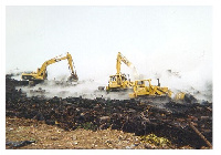 File photo: A seized excavator being transported